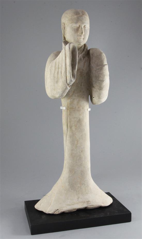 A large Chinese grey pottery figure of a dancer, Han dynasty (2006BC-220AD), height 55.5cm, modern stand